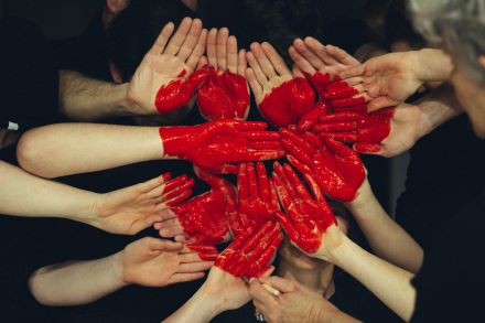 Group of hands showing a heart